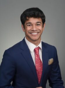 Professional photo of Yash in suit and tie